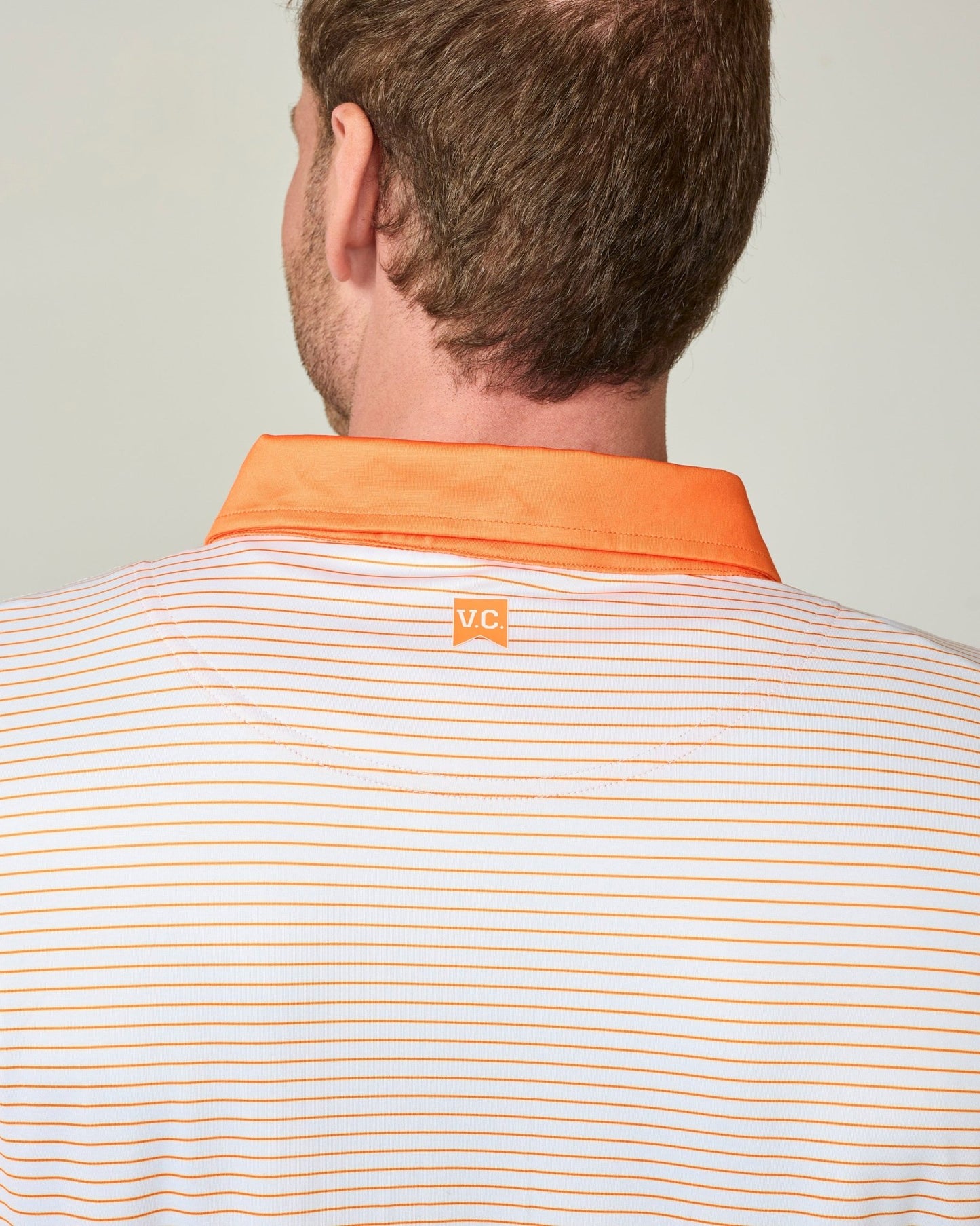 Retro Helmet Polo - The Volunteer Club