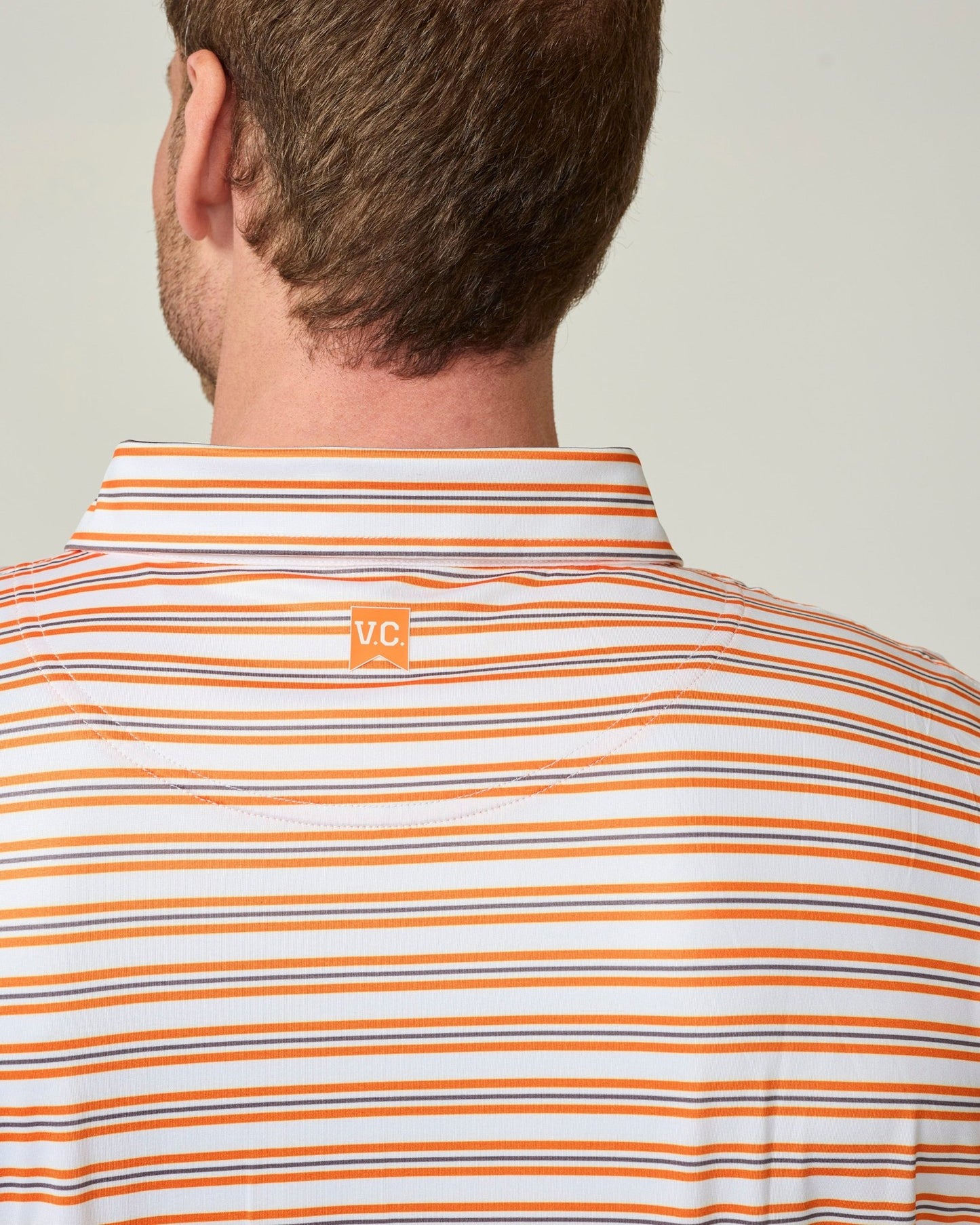Orange & Grey Striped Polo - The Volunteer Club